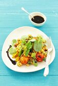 Fried vegetables with a chickpea and tomato salad