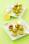 Cucumber and smoked salmon rolls with a dip