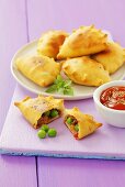 Stuffed pastry parcels with ham, peas and pepper