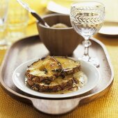 Grilled pineapple slices with honey and almonds