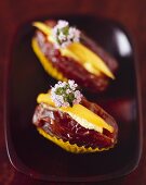 Dates stuffed with mango and soft cheese
