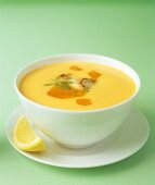 Cream of carrot soup with grilled scallop, carrot puree