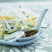 Asian rice noodle and courgette salad with yellow beans