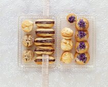 Chocolate-filled finger biscuits, lavender biscuits, almond duchesse biscuits