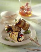Aubergine rolls filled with sheep's cheese and spicy spread