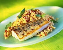 Fried zander with barley and pepper risotto