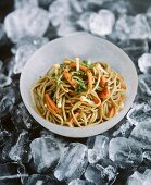 Oriental noodle salad with enokitake and ice cubes