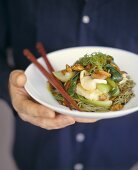 Noodles with bok choy and fish