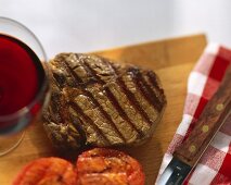 A grilled ribeye steak, cut open