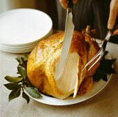 Carving a whole roast turkey