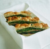 Focaccia sandwich with ham, spinach and chees