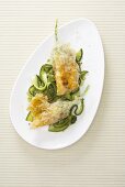 Baked courgette flowers with a polenta and olive filling