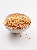 Red lentils in a ceramic bowl