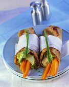 Pancake rolls filled with carrots and chive cream