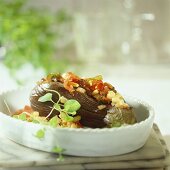Stuffed aubergine with fruity pepper filling