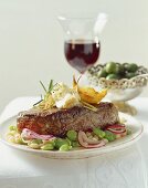 Bistecca alla fiorentina (Beefsteak with bean salad)