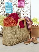 Beach bag, sandals and beach towels