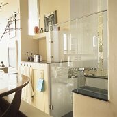 Bathroom with glazed shower cubicle