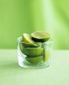 Halved limes in a glass