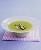 A dish of broad bean soup with tapenade