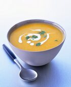 Spicy pumpkin soup with parsley and crème fraîche