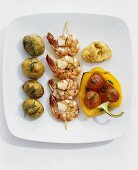 Prawn skewer with rosemary potatoes and grilled vegetables