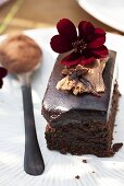 A chocolate slice with a chocolate flower