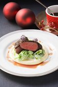 Saddle of venison with a coffee crust on creamy parsnip puree