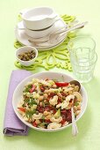 Pasta salad with chickpeas, dried tomatoes and capers