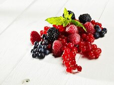 Various berries on a wooden table
