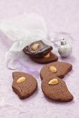 Moon-shaped chocolate and almond biscuits