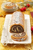 Christmas poppyseed strudel with icing sugar