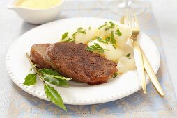 Pork escalope with potatoes, silver onions and Bearnaise sauce