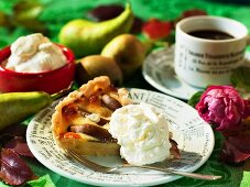 A piece of pear tart with cream