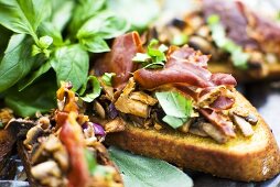 Toasted baguette with mushrooms and ham