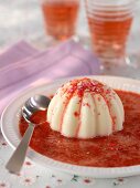 Yogurt pudding with strawberry sauce