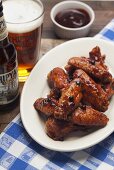 Chicken wings with sauce and beer