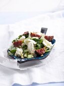 Fig and buffalo mozzarella salad with an orange and honey dressing