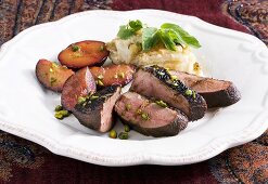 Duck breast with plums and celery