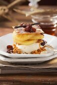 Layered strudel with vanilla ice cream, apples and raisins