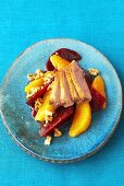 Duck breast on beetroot and orange salad with walnuts