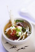 Miso soup with tofu and enoki mushrooms