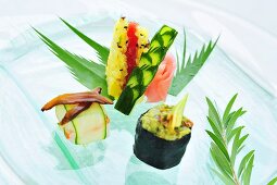 Salmon, tuna and guacamole sushi