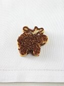 Reindeer biscuit with grated chocolate