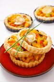 Goat's cheese and vegetable puff pastry tartlets