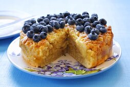Apple crumble cake with fresh bluberries
