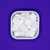 Sugar cubes in a square bowl (overhead view)