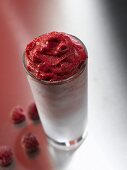 Raspberry and lime sorbet in a glass