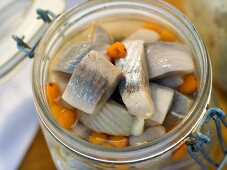 Pickled herrings with sea buckthorn berries