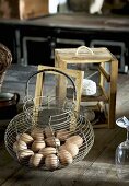 Fresh eggs in wire basket